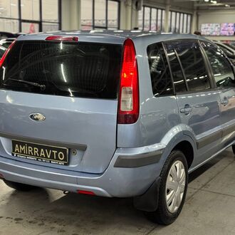 Ford Fusion 1.6 AT ( 100 л.с.)