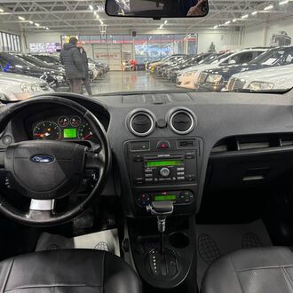 Ford Fusion 1.6 AT ( 100 л.с.)