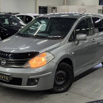 Nissan Tiida 1.6 AT (110 л.с)