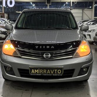 Nissan Tiida 1.6 AT (110 л.с)