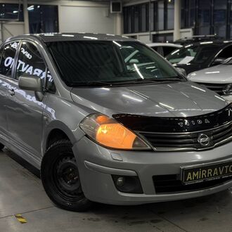 Nissan Tiida 1.6 AT (110 л.с)