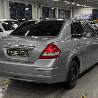 Nissan Tiida 1.6 AT (110 л.с)