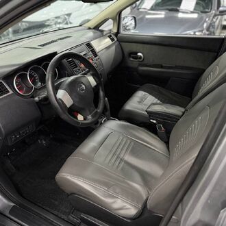 Nissan Tiida 1.6 AT (110 л.с)