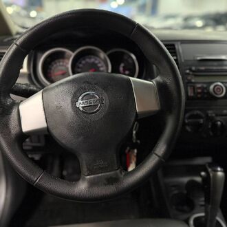 Nissan Tiida 1.6 AT (110 л.с)