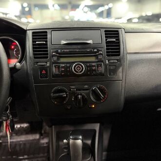 Nissan Tiida 1.6 AT (110 л.с)